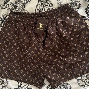 Louis Vuitton Paris swim shorts.